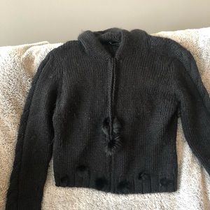 Black zip front sweater with rabbit fur detail